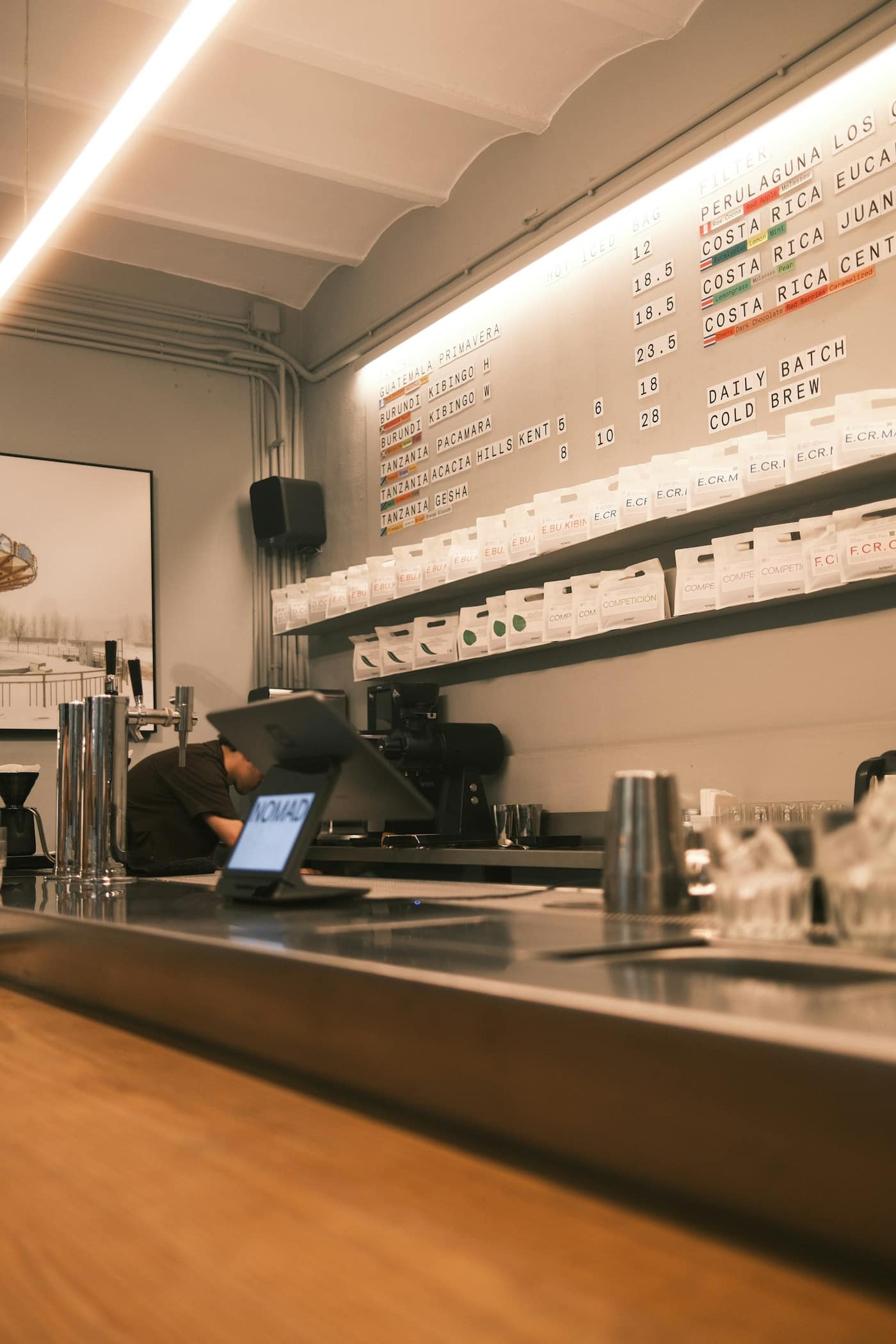 A small business owner working on a laptop