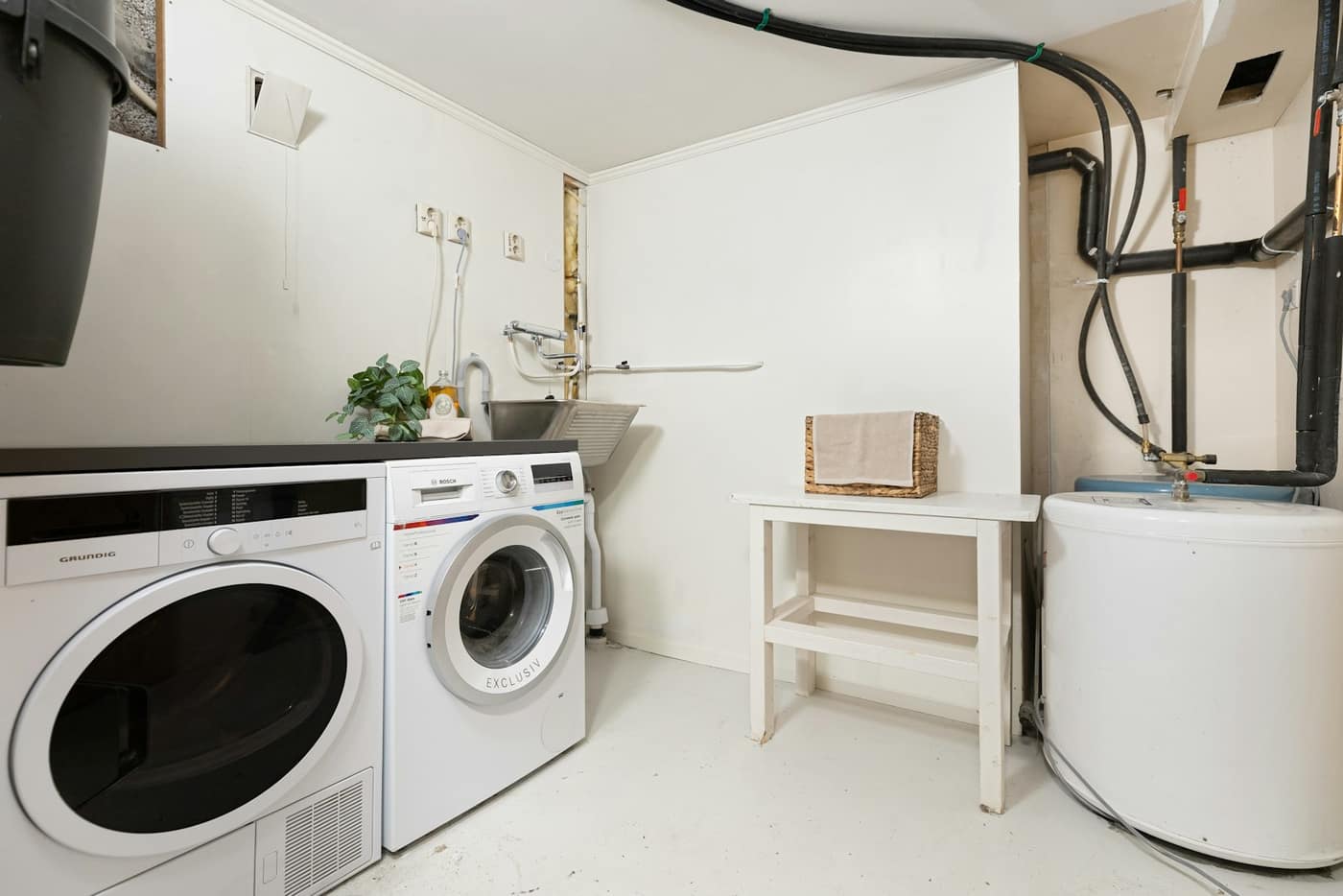 A washer and dryer in a laundry room
