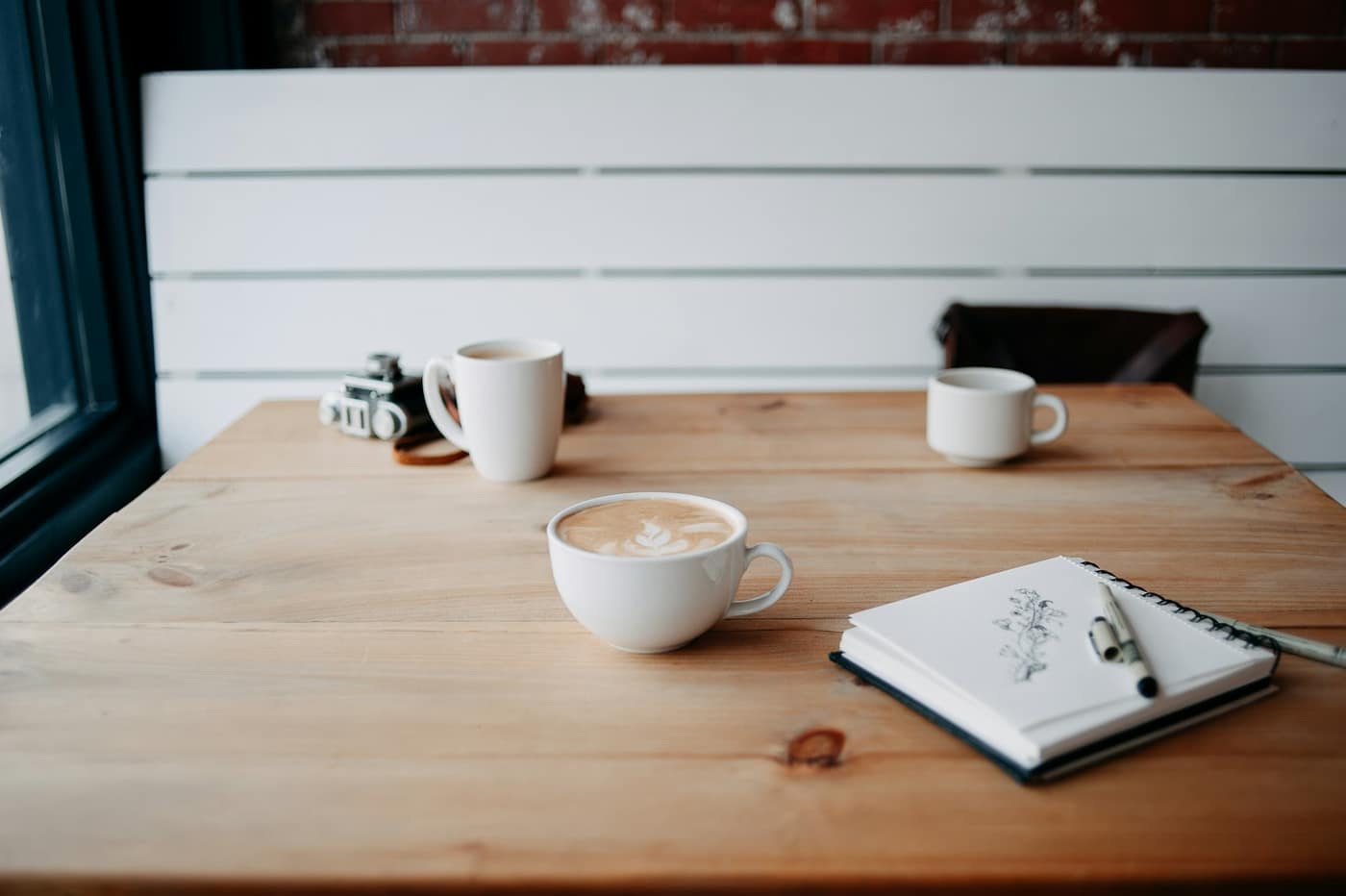 Two cups of coffee on a table