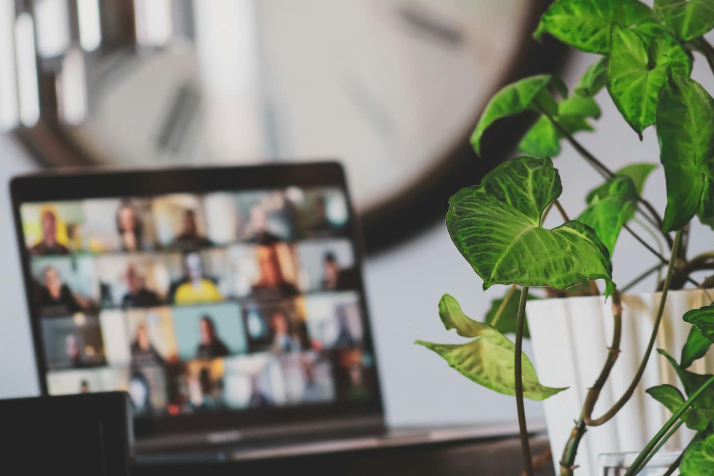 A laptop showing a video call
