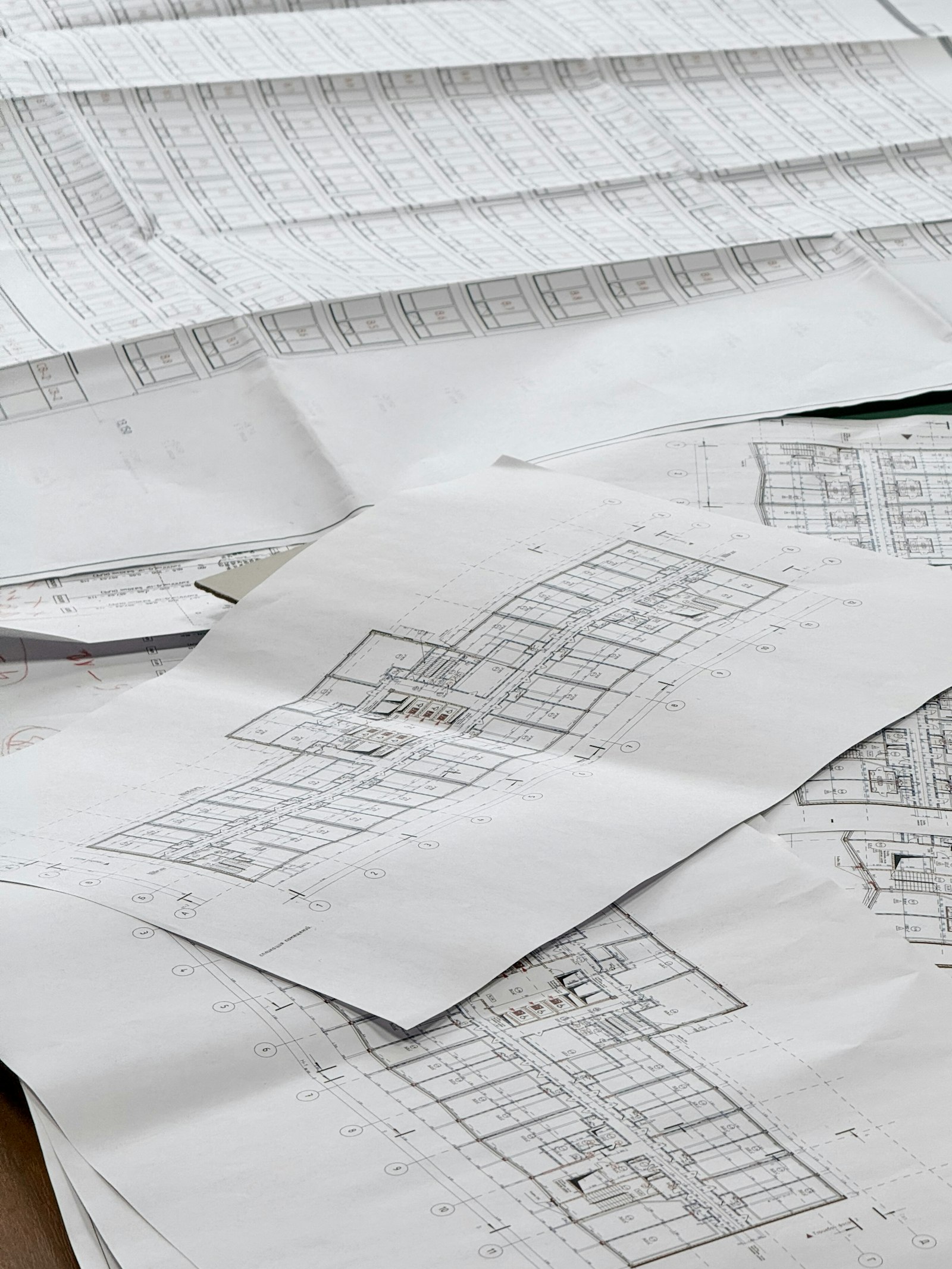 Architectural blueprints and plans on a table