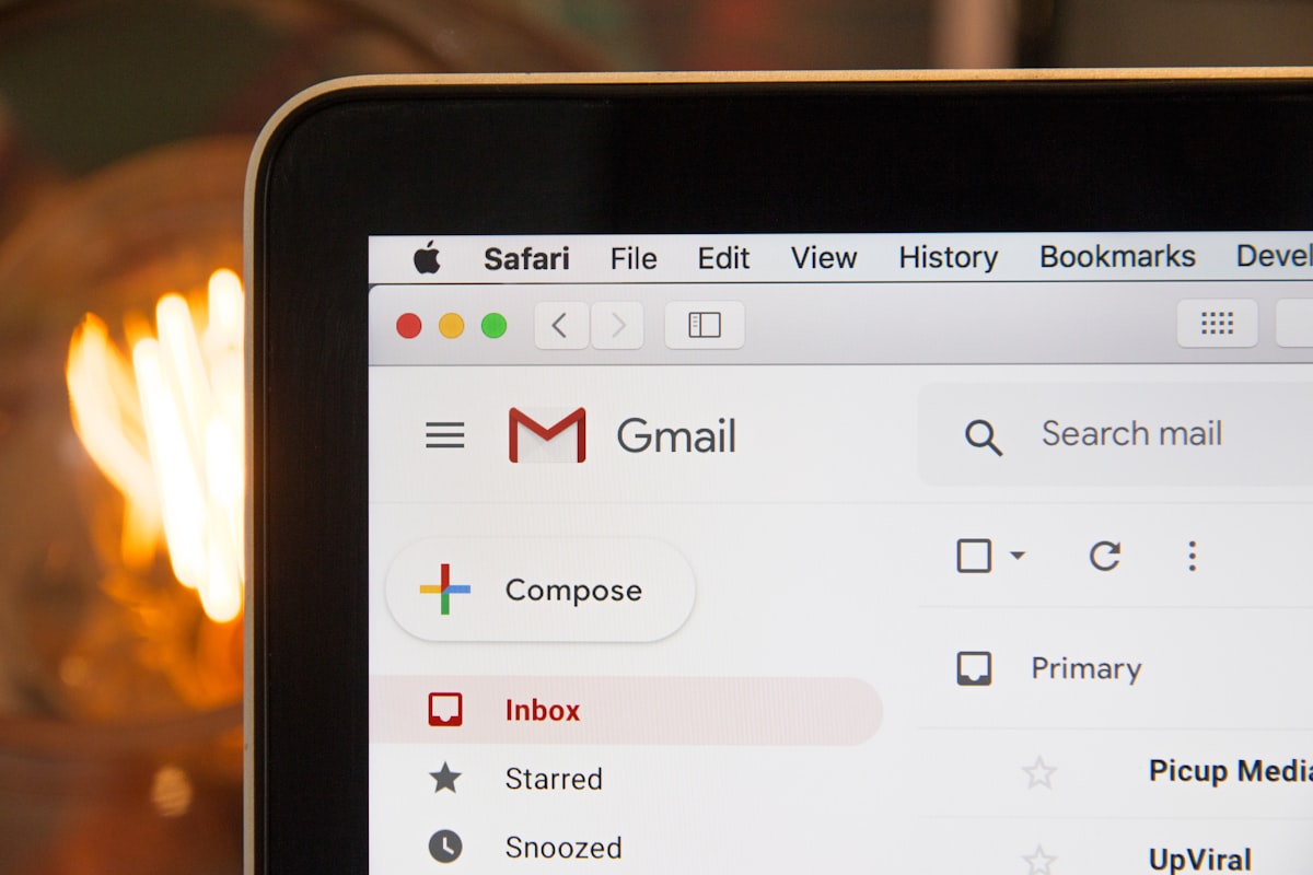 A laptop open to a fresh email being written