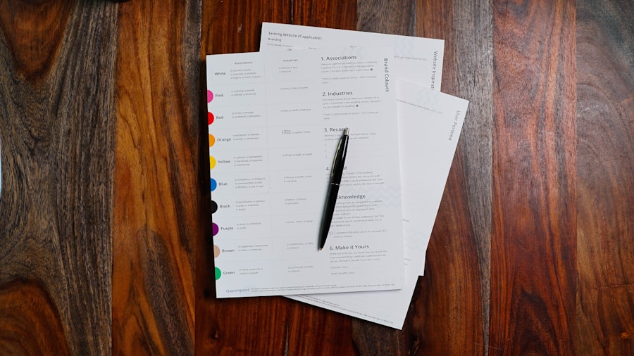 A neatly organised stack of papers on a wooden surface