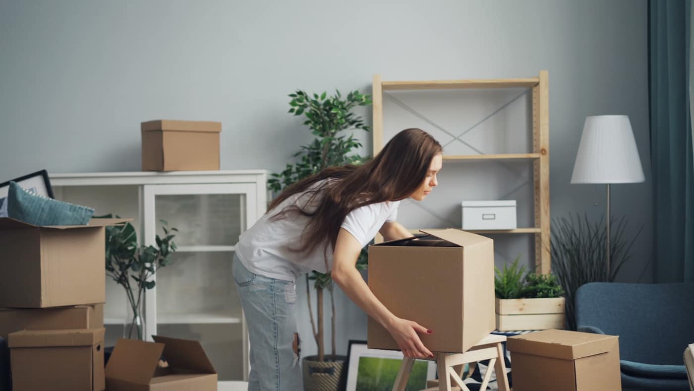 Packing boxes at home before a move