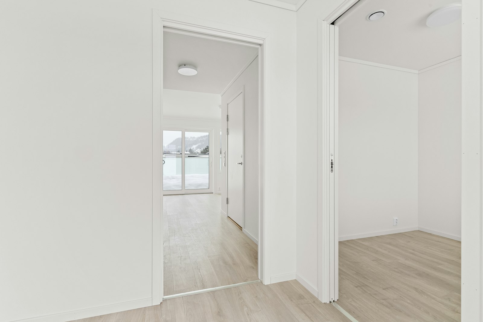An empty room with freshly painted white walls
