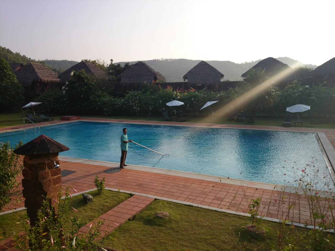 A clean swimming pool being maintained
