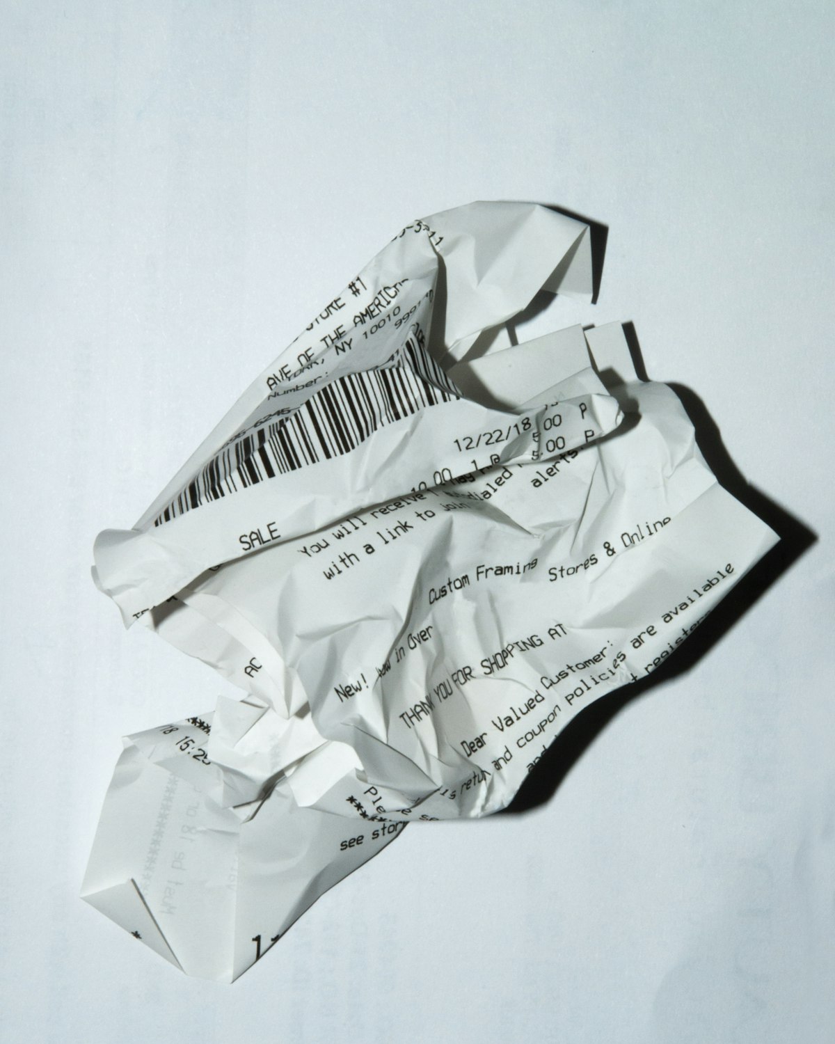 A receipt resting on a clean white surface