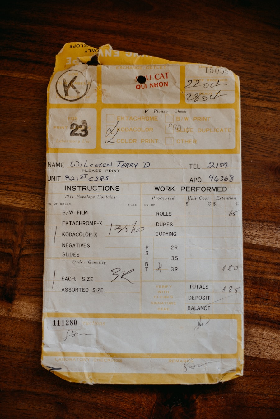 A small paper receipt on a wooden table