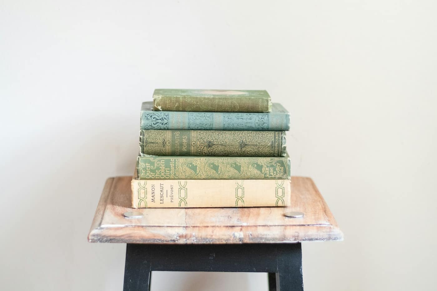 A stack of books on a desk